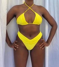 Load image into Gallery viewer, Envy Bikini in Yellow on our female model 
